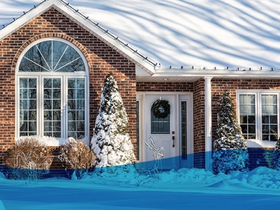 Home covered in snow